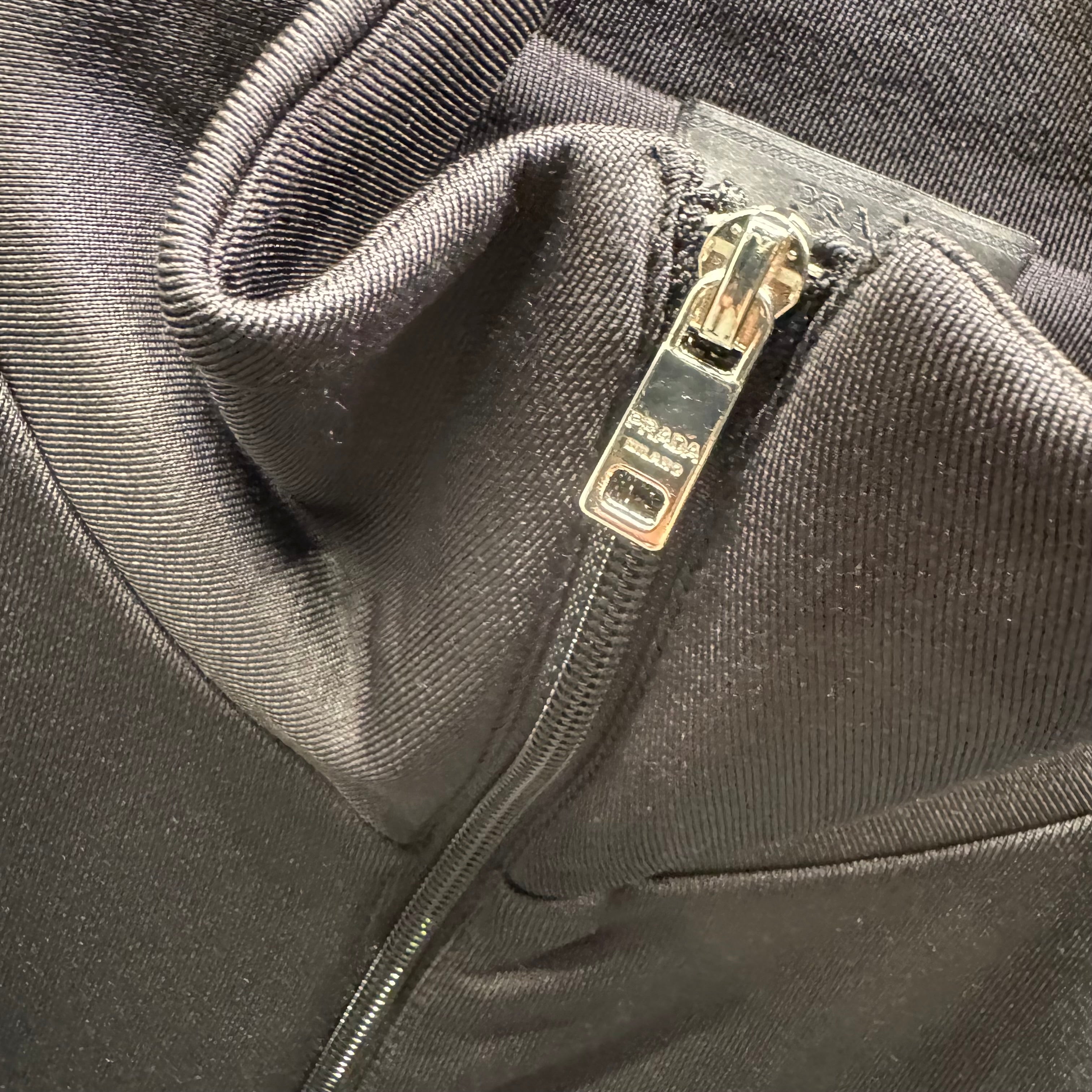 Prada triangle logo track suit