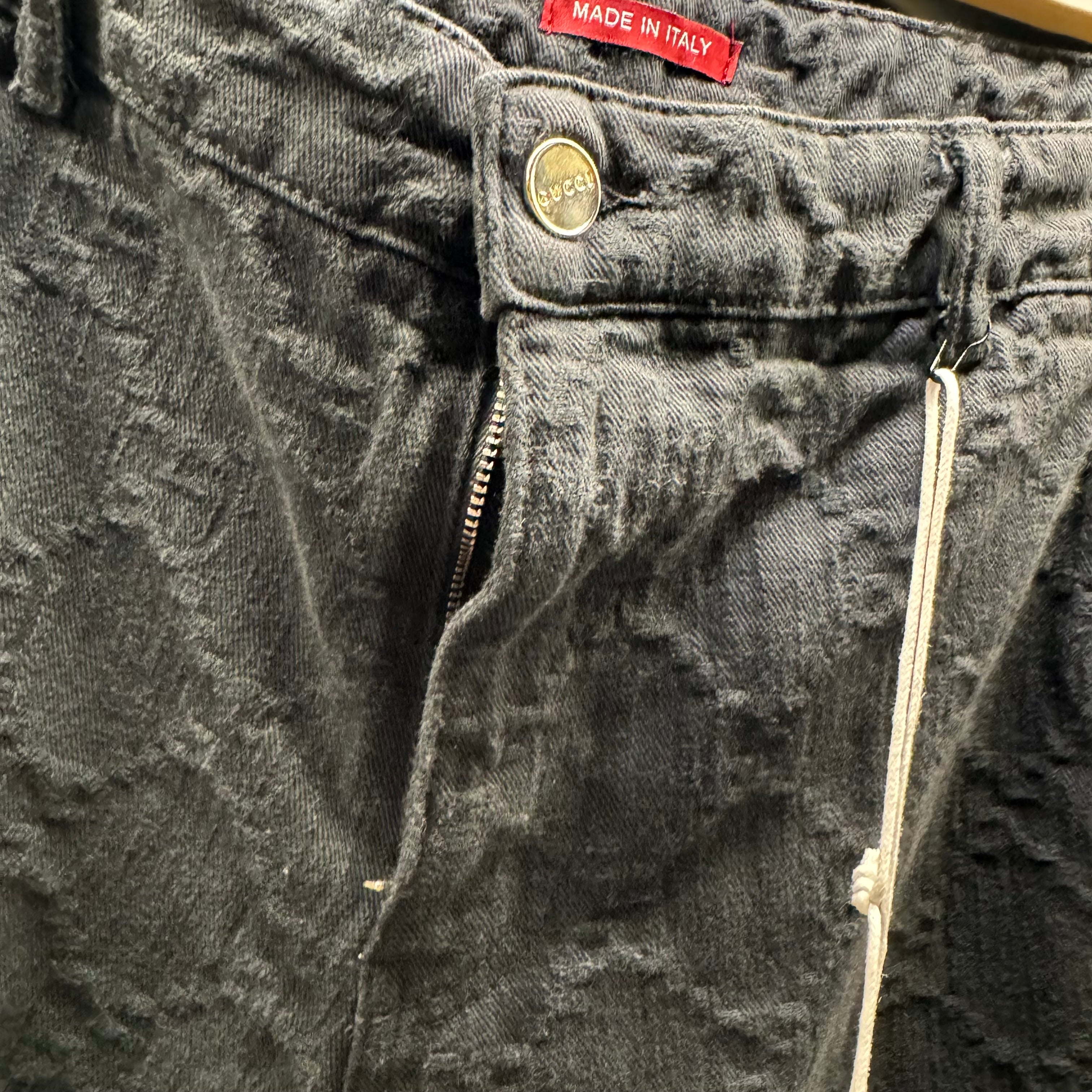 Gucci bleached monogram denim pants