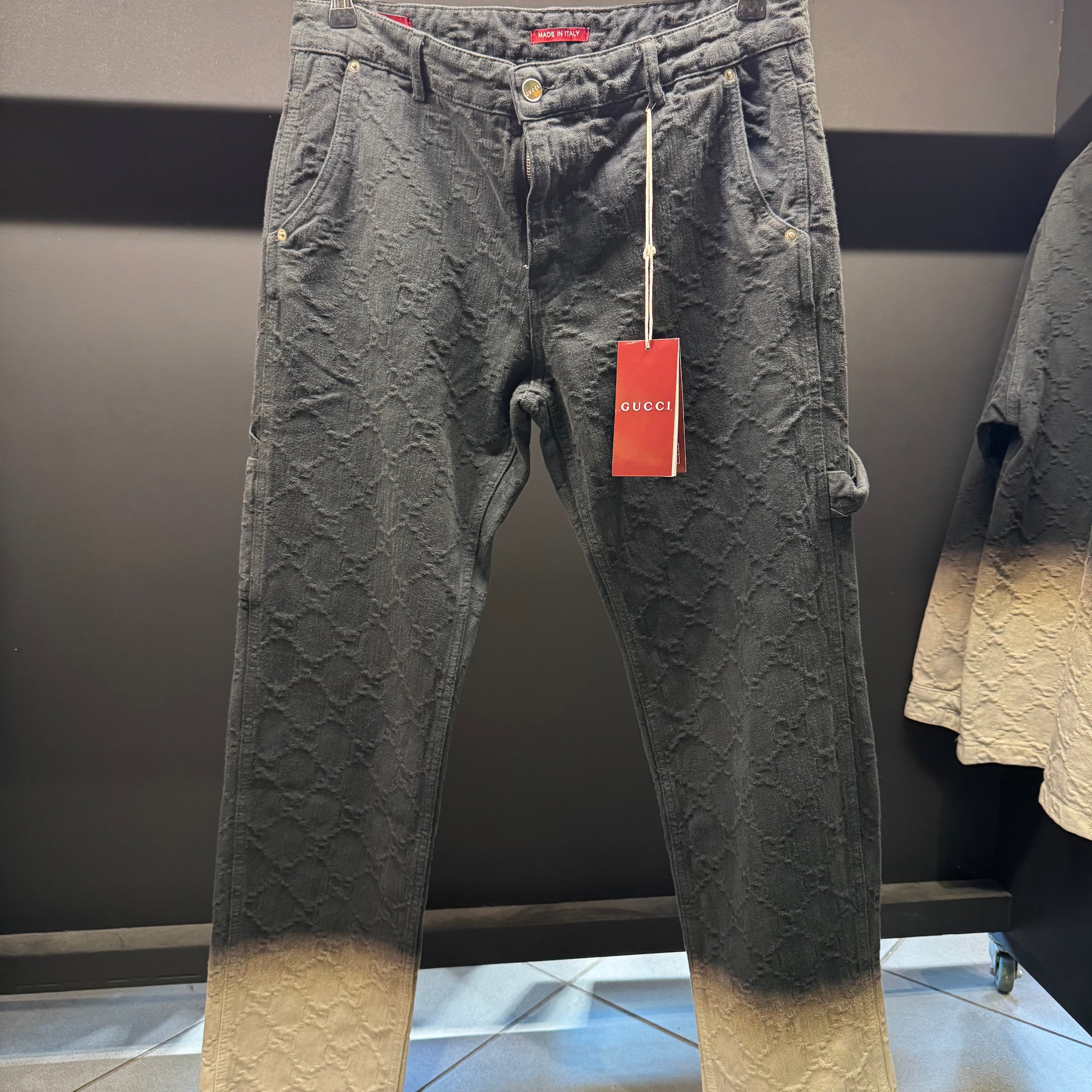 Gucci bleached monogram denim pants