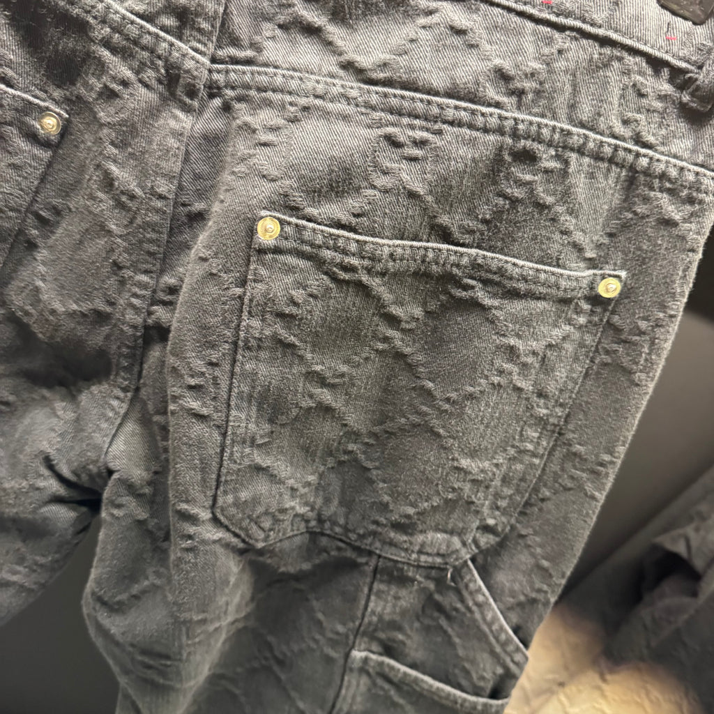 Gucci bleached monogram denim pants