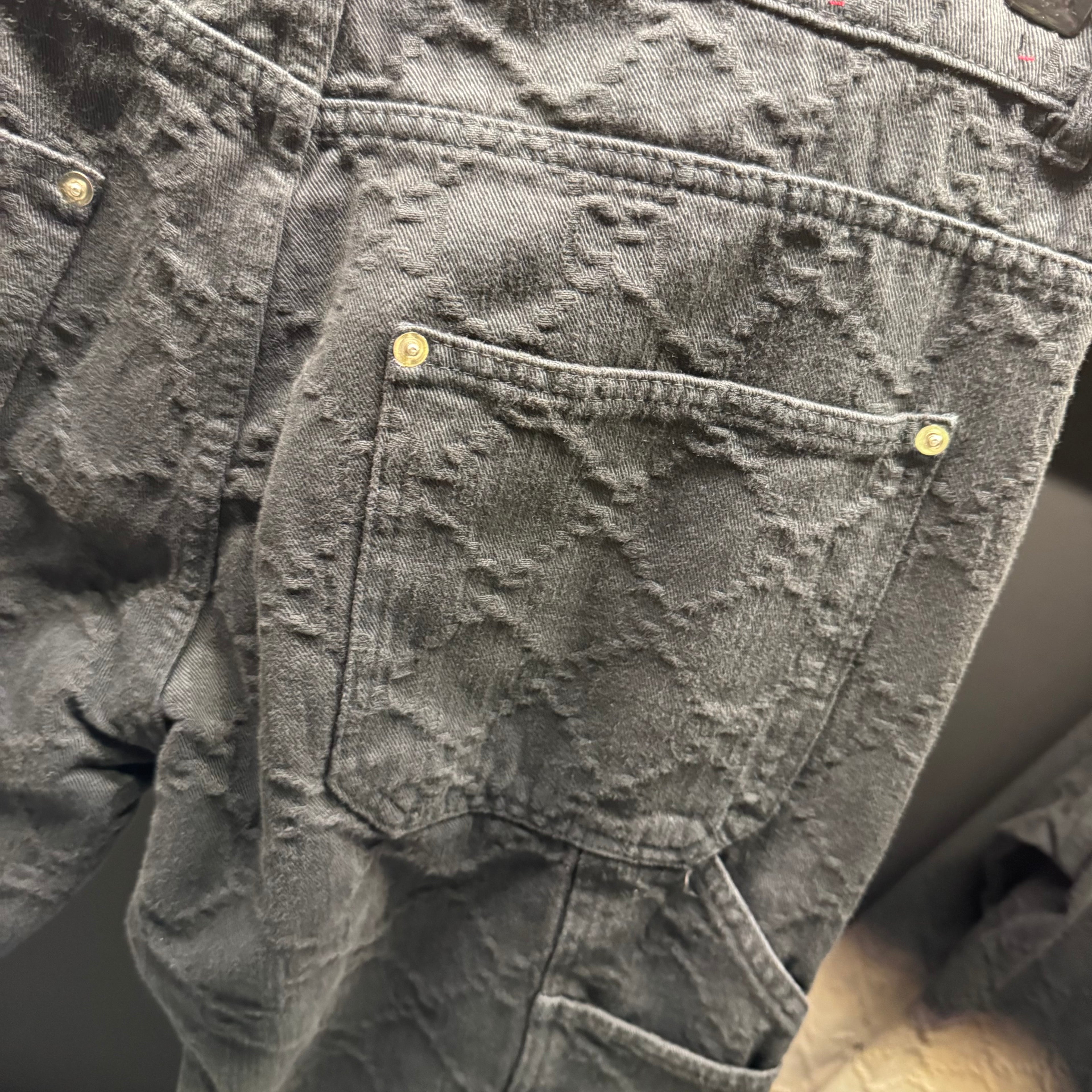 Gucci bleached monogram denim pants